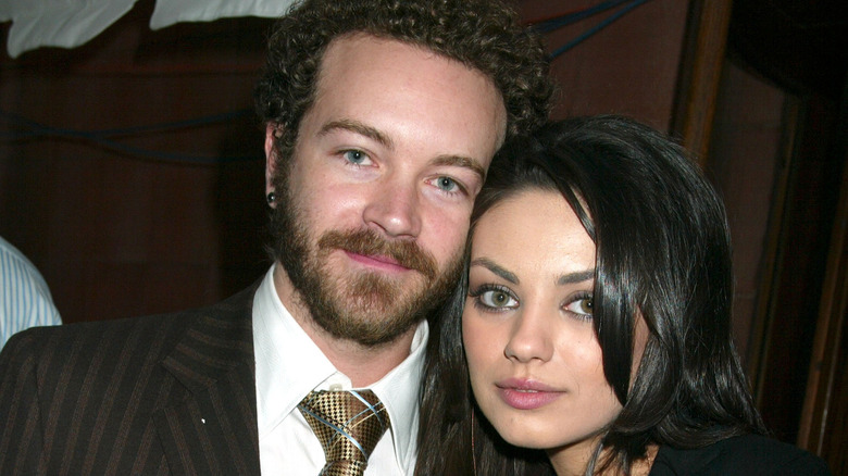 Danny Masterson and Mila Kunis striped suit