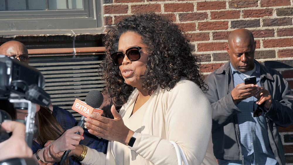 Oprah Winfrey speaking to reporters