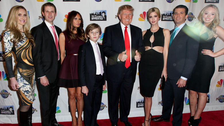 Donald Trump posing with his wife and children