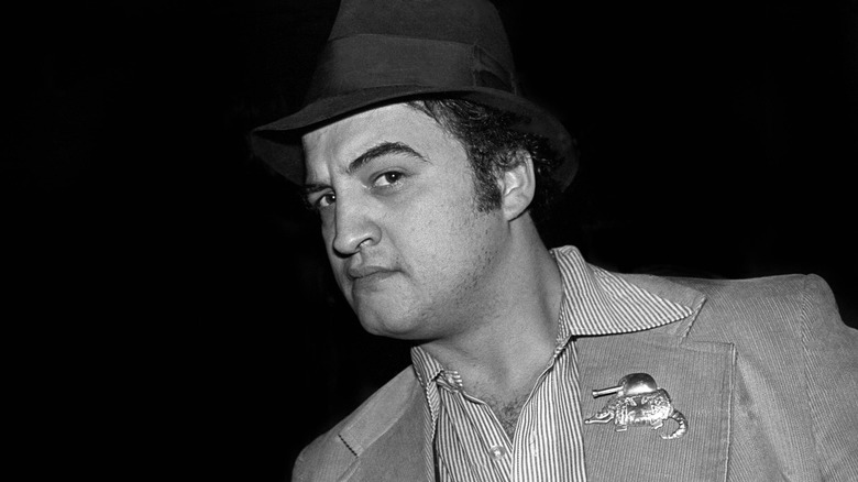 John Belushi raising an eyebrow