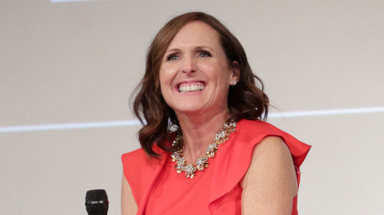 Molly Shannon smiling onstage 