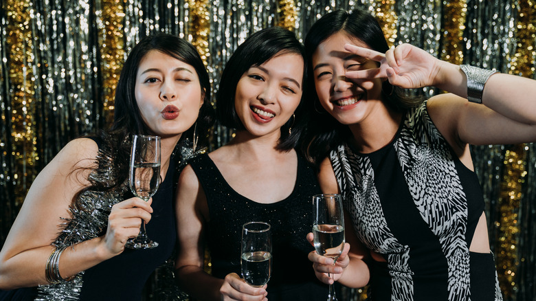 three women at a party