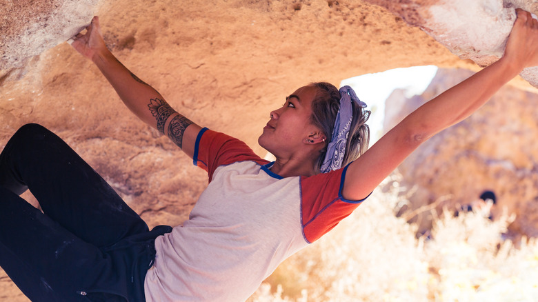 a woman rock climbing