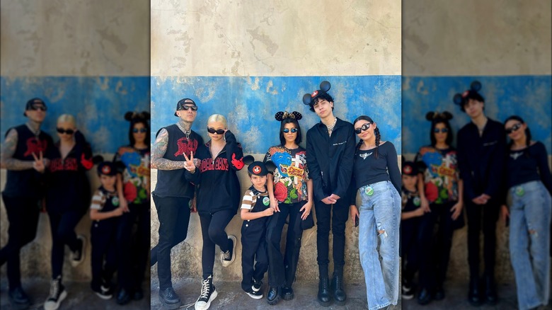 Travis Barker and Kourtney Kardashian Barker with their kids at Disneyland