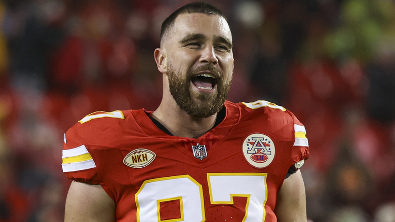 Travis Kelce yelling in football uniform