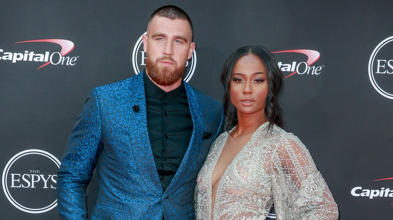 Travis Kelce and Kayla Nicole posing