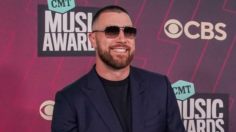 Travis Kelce at the CMT Awards red carpet