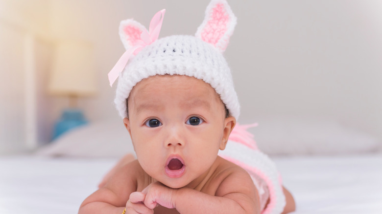 Baby girl with bunny ears hat