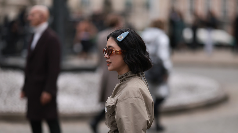 woman wearing miu miu clip