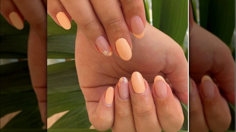 pale orange fingernails with flowers