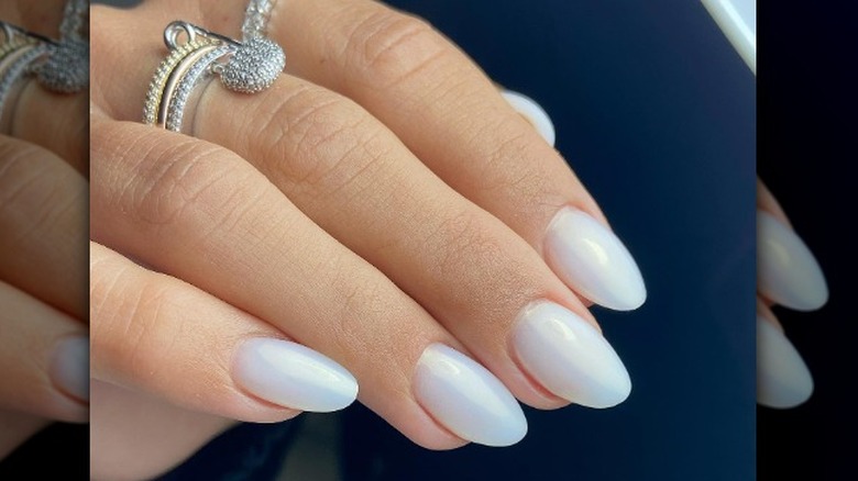 hand with pearly white nails