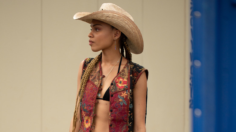 Girl with braids and cowboy hat