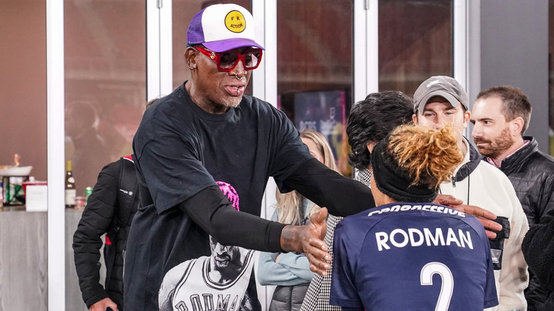 Dennis Rodman hugging Trinity Rodman