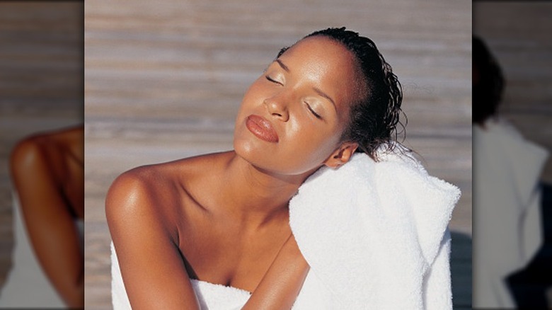 A woman with wet hair. 