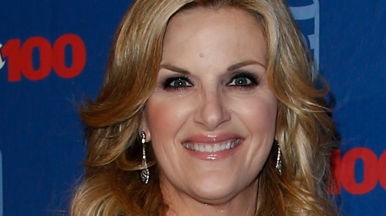 up close photo of Trisha Yearwood on red carpet