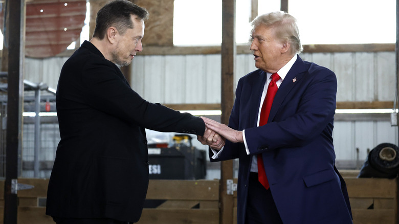 Donald Trump shaking Elon Musk's hand