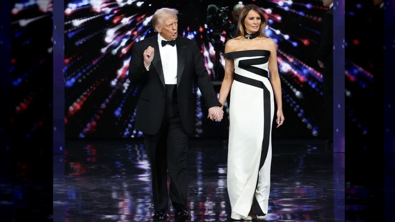 Donald Trump and Melania Trump holding hands and the Liberty Ball