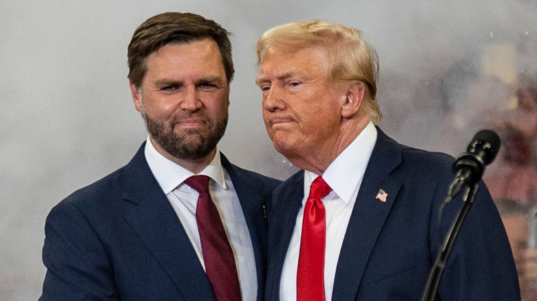 JD Vance smiling alongside Donald Trump.