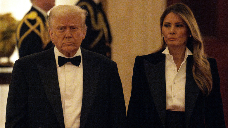 Donald Trump walking alongside Melania Trump