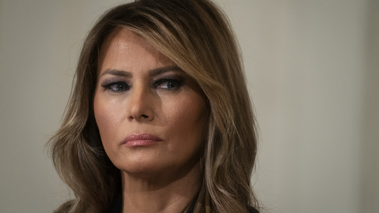 Melania Trump looking off to the side