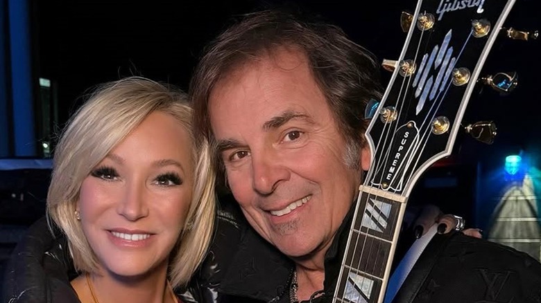 Paula White and Jonathan Cain smiling.