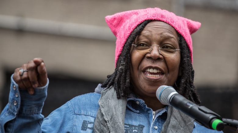 Whoopi Goldberg wearing a p**** hat