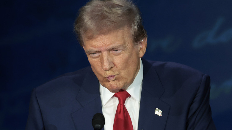 Donald Trump pursing his lips