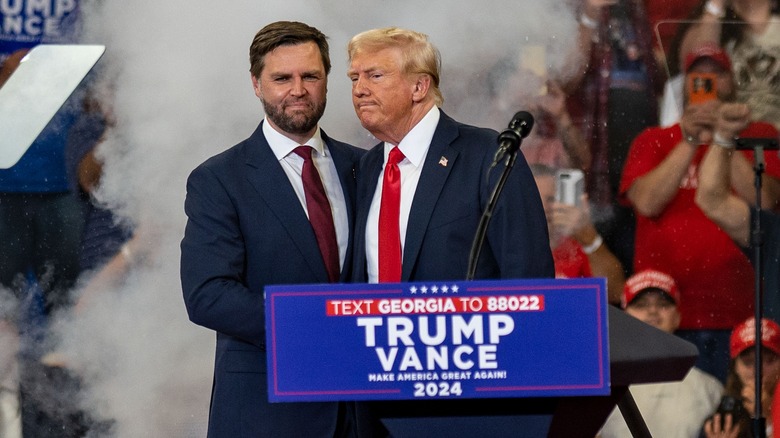 Donald Trump and JD Vance shaking hands