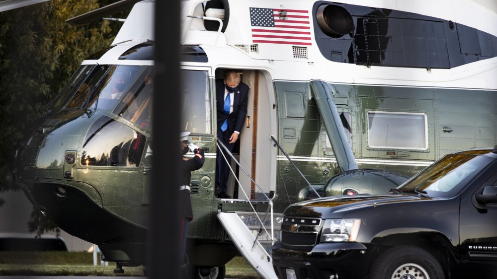 Trump exiting the helicopter