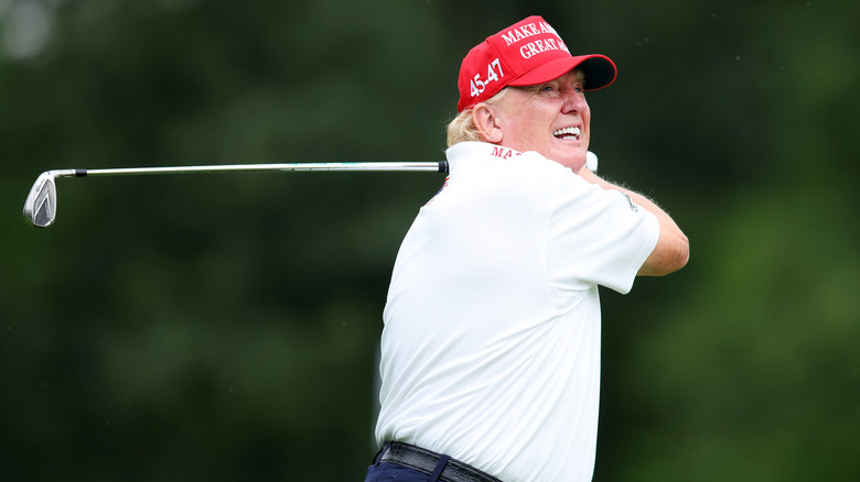 Donald Trump swinging his golf club