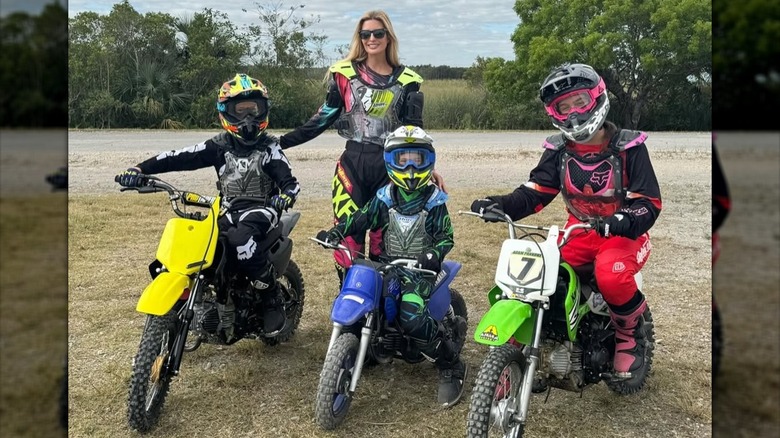 Ivanka Trump posing with her kids on motorbikes