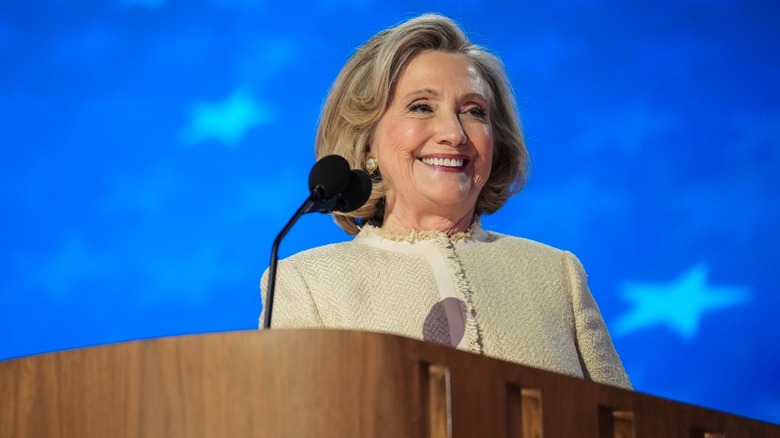 Hillary Clinton smiling at podium