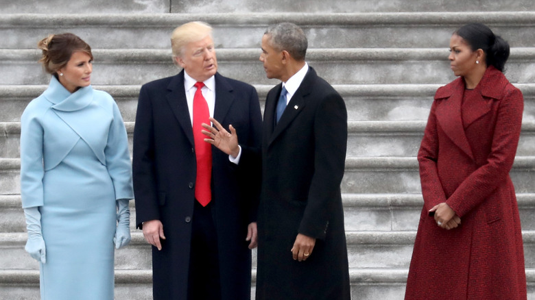 Melania and Donald Trump and Barack and Michelle Obama standing together