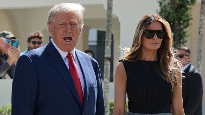 Donald Trump talking next to Melania Trump