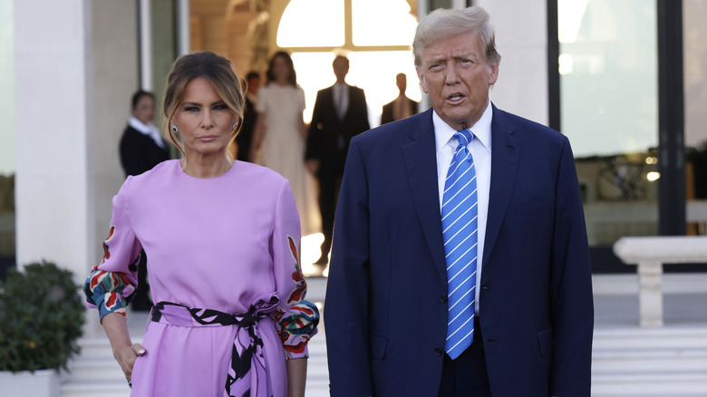 Melania Trump and Donald Trump posing together at an event