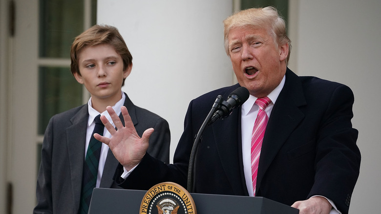 Barron Trump watching Donald Trump speak