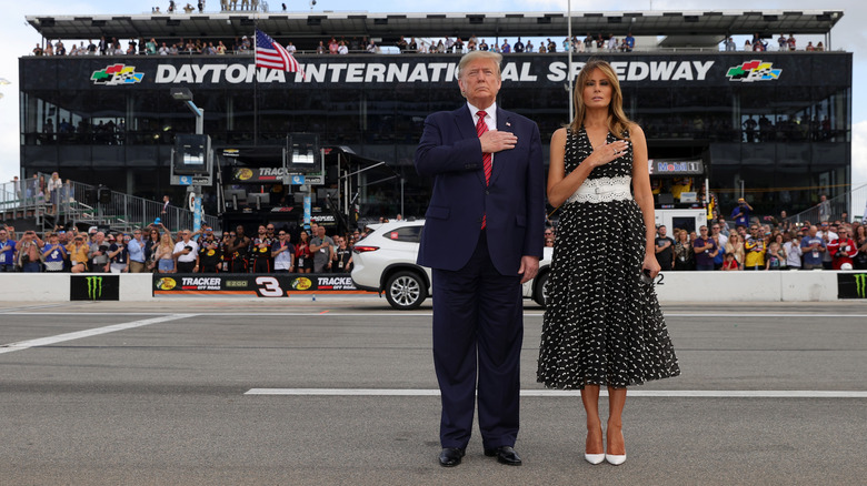 Donald and Melania Trump saluting at Daytona 500 2020