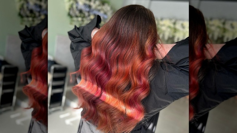 Woman with warm-toned fruit juice hair