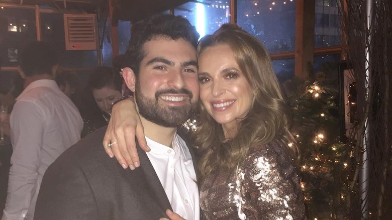 Jeremy Scher and TV host Jedediah Bila at a party 