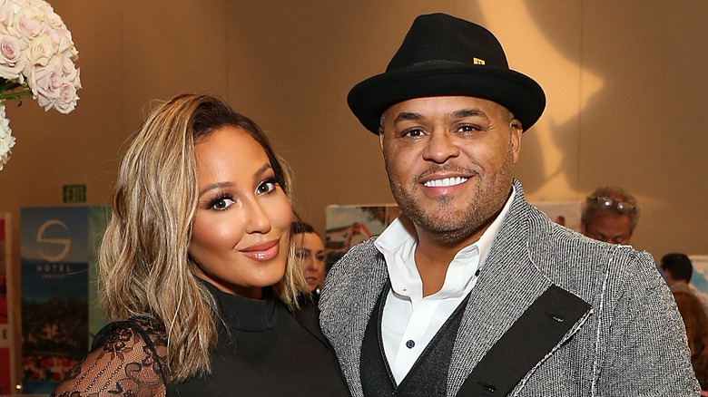 TV host Adrienne Bailon and husband Israel Houghton at an event