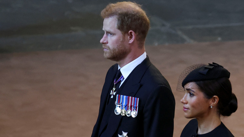 Meghan Markle and Prince Harry at the queen's procession 