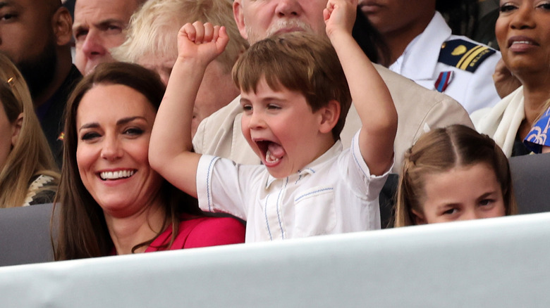Prince Louis acting silly at an event