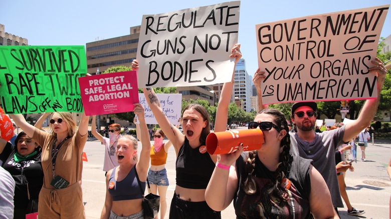 People attend a Pro-choice rally