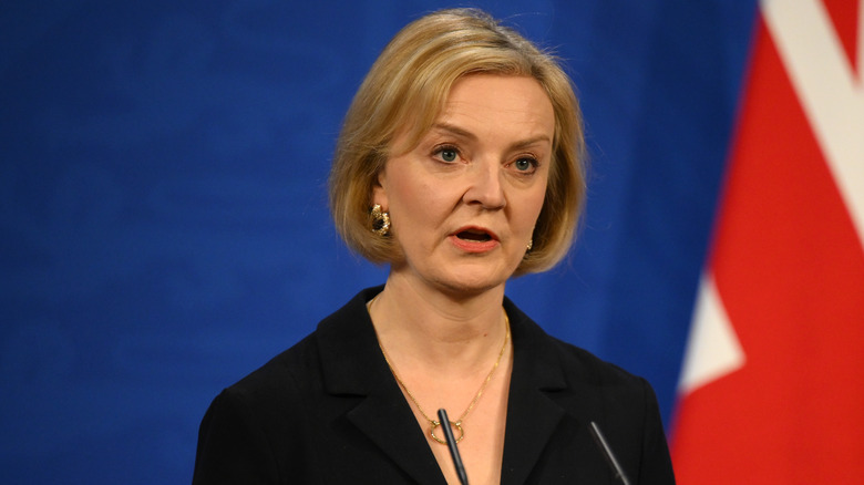 Liz Truss talking at podium