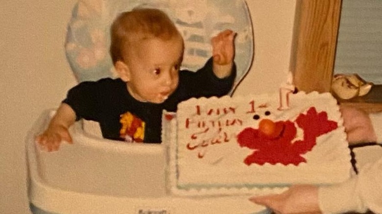 Tyler Henry as a child with father