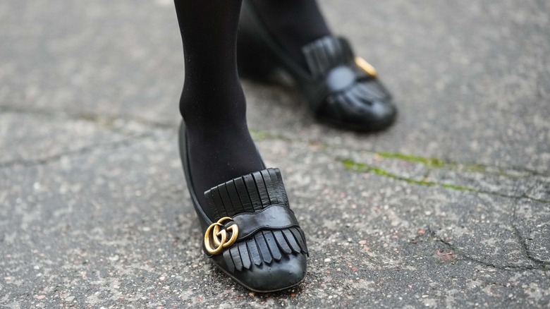 Gucci lack leather loafers with gold