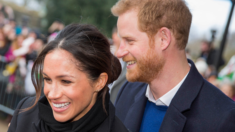 Prince Harry and Meghan Markle smiling 