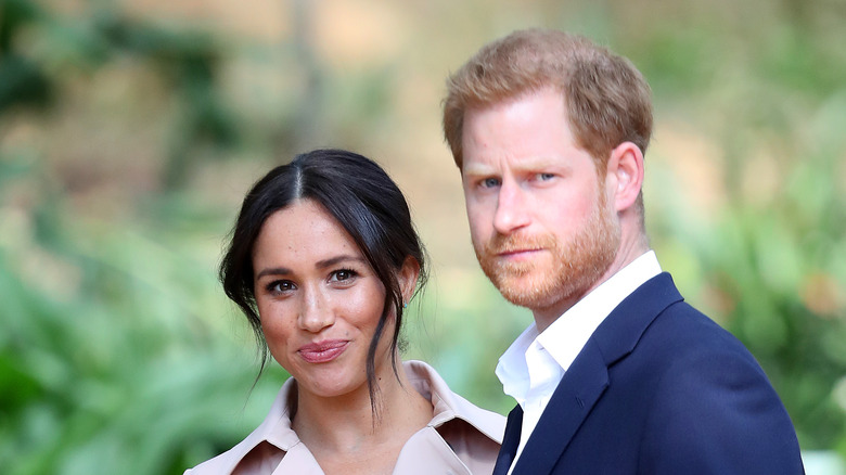 Meghan Markle and Prince Harry smiling 