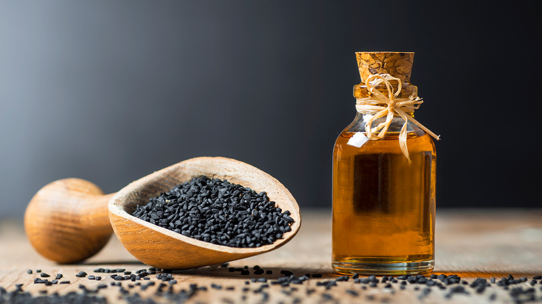 black seed oil with black background