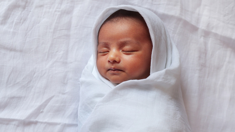 Baby sleeping in blanket